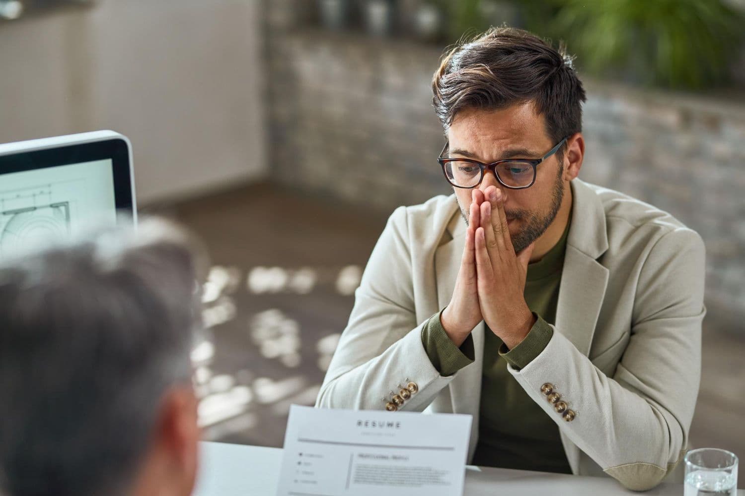 photologuephotos2022-10distraught-young-man-feeling-uncertain-while-having-job-interview-in-the-office_1jpg photologuephotos2022-10distraught-young-man-feeling-uncertain-while-having-job-interview-in-the-office_1jpg