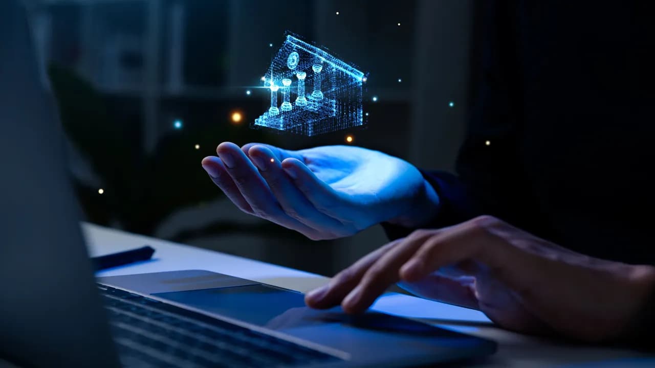 photologuephotos2023-10mano-hombre-que-sostiene-holograma-icono-banco-tecnologia-moneda-digital-blockchain-concepto-banco-virtual-defi_2jpg photologuephotos2023-10mano-hombre-que-sostiene-holograma-icono-banco-tecnologia-moneda-digital-blockchain-concepto-banco-virtual-defi_2jpg