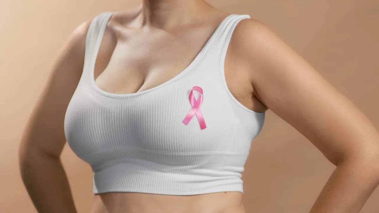 photologuephotos2024-03young-lady-white-top-with-ribbon-sign-her-chest-support-pink-october-females-combating-breast-cancer-anonymous-studio-shot-photo-beige-background_1jpg photologuephotos2024-03young-lady-white-top-with-ribbon-sign-her-chest-support-pink-october-females-combating-breast-cancer-anonymous-studio-shot-photo-beige-background_1jpg