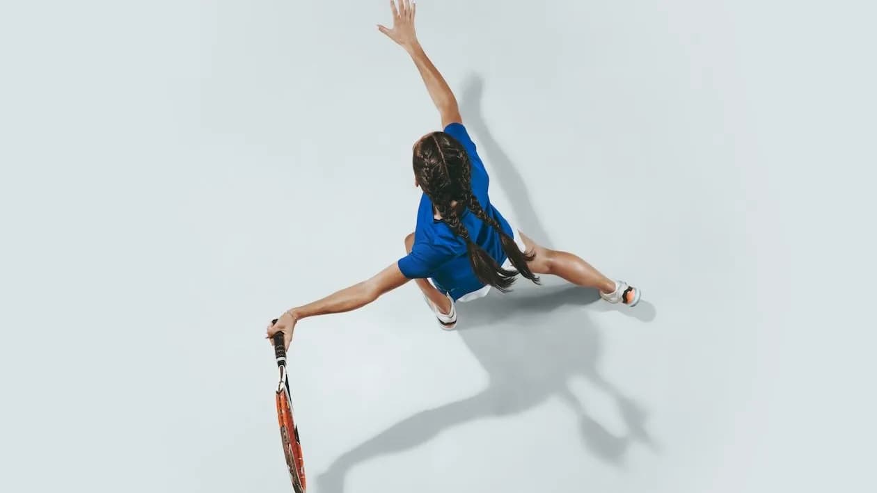 photologuephotos2024-06young-woman-blue-shirt-playing-tennis-she-hits-ball-with-racketjpg photologuephotos2024-06young-woman-blue-shirt-playing-tennis-she-hits-ball-with-racketjpg