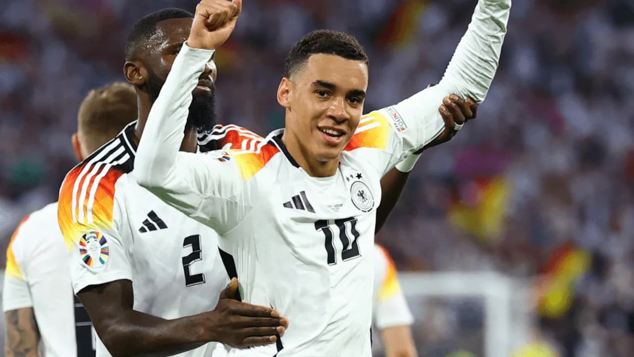 photologuephotos2024-06jamal_musiala_celebra_su_primer_gol_en_la_eurocopa_2024_junto_a_rudiger_0png photologuephotos2024-06jamal_musiala_celebra_su_primer_gol_en_la_eurocopa_2024_junto_a_rudiger_0png