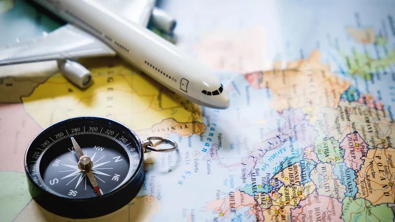 photologuephotos2022-10selective-focus-of-miniature-tourist-on-compass-over-map-with-plastic-toy-airplane-abstract-background-to-travel-conceptjpg photologuephotos2022-10selective-focus-of-miniature-tourist-on-compass-over-map-with-plastic-toy-airplane-abstract-background-to-travel-conceptjpg